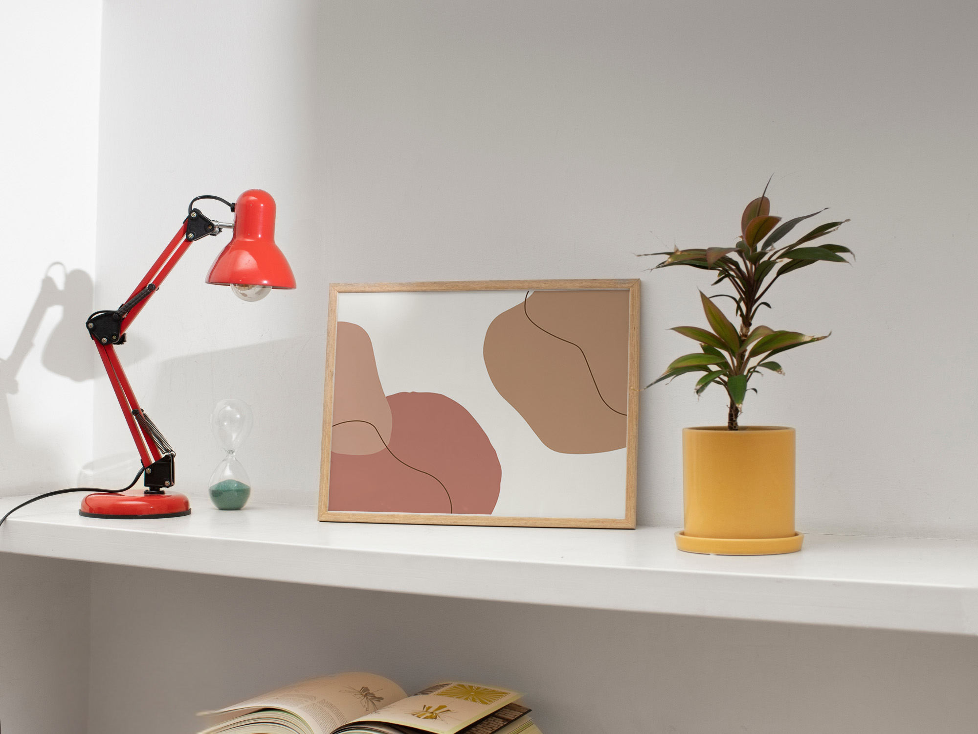 Photo Frame On a Shelf With Lamp And Plant