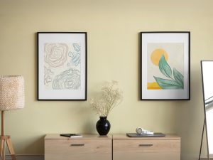 2 Photo Frames On Wall With Wooden Cabinet