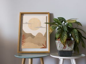 Photo Frame On A Stool With Plant