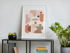 Photo Frame On A Shelf With Plant And Fruits